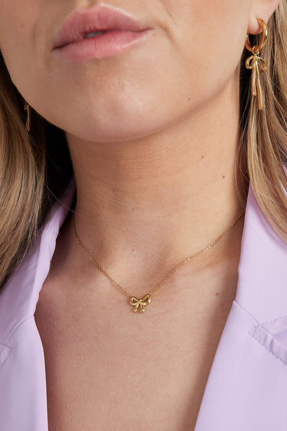Minimalistische strik ketting roestvrijstaal - kleur goud 