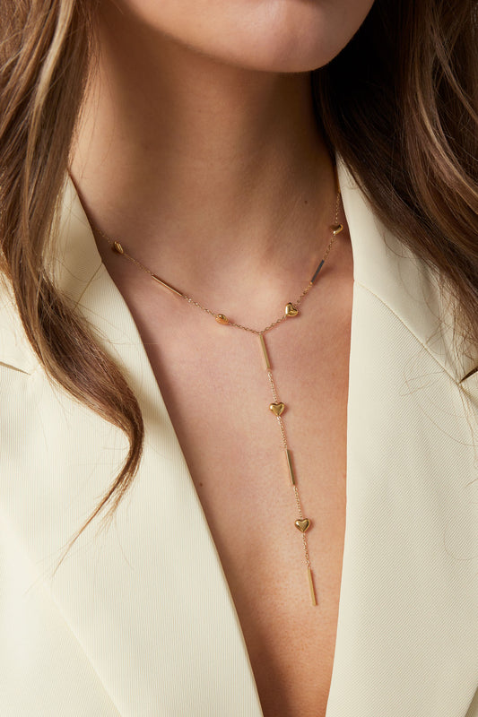 Gouden Y-ketting met kleine hartjes details van stainless steel
