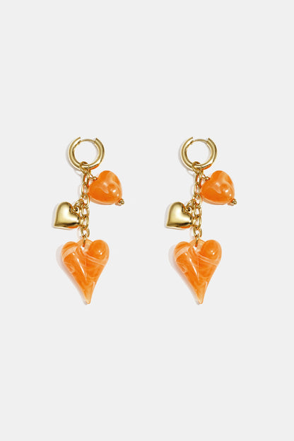 Dames Oorringen met orange acryl hart charms