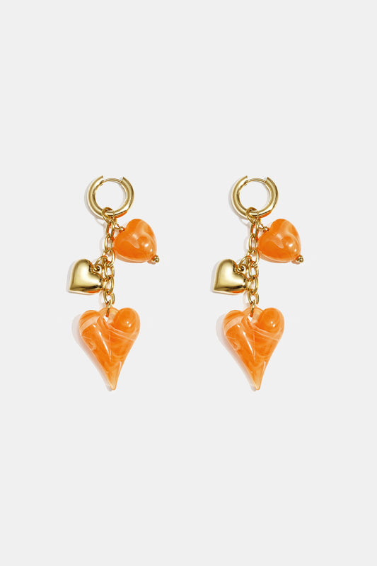 Dames Oorringen met orange acryl hart charms