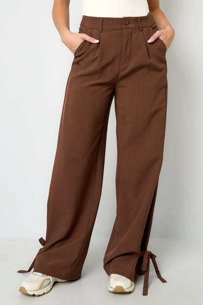Broek met strikjes