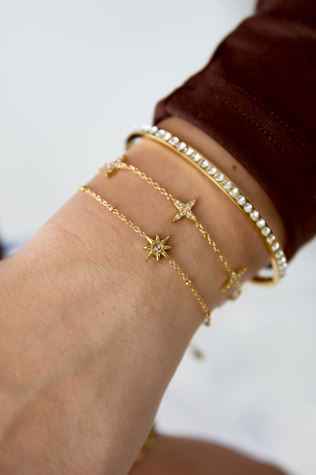 Armband met bolletjes en vallende ster met steen