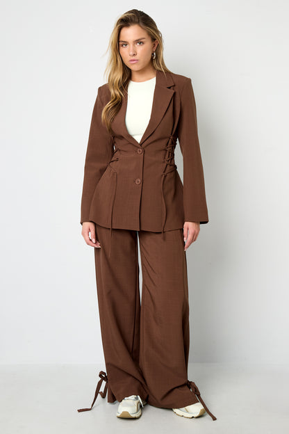 Broek met strikjes