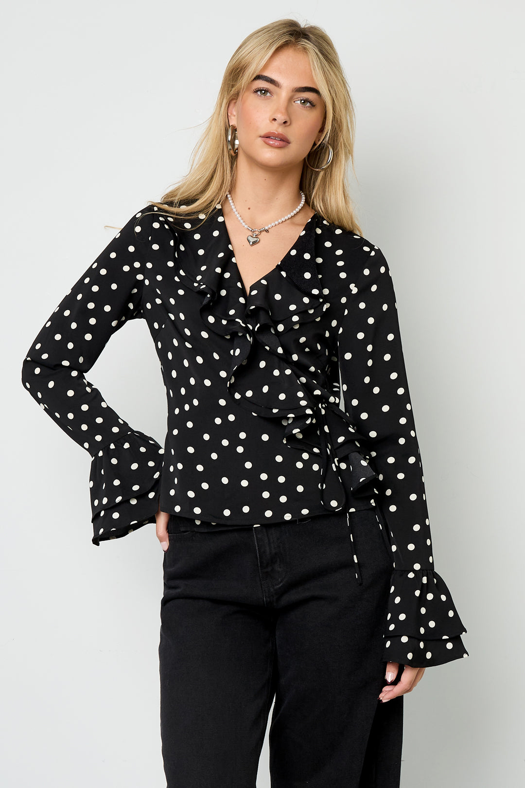 Zwarte blouse met polkadots