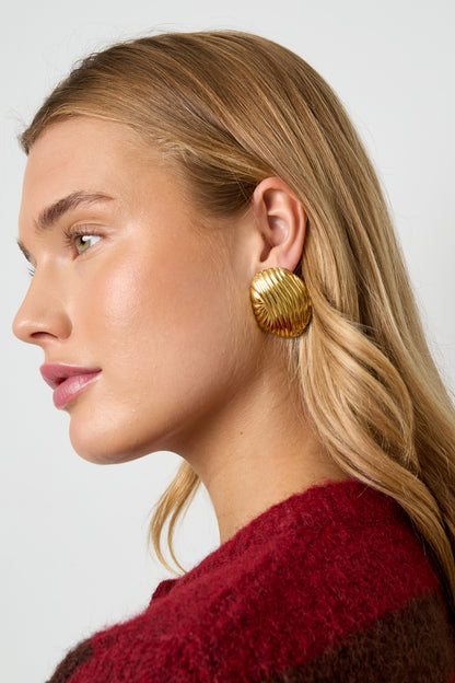 Gouden sculpted statement oorbellen